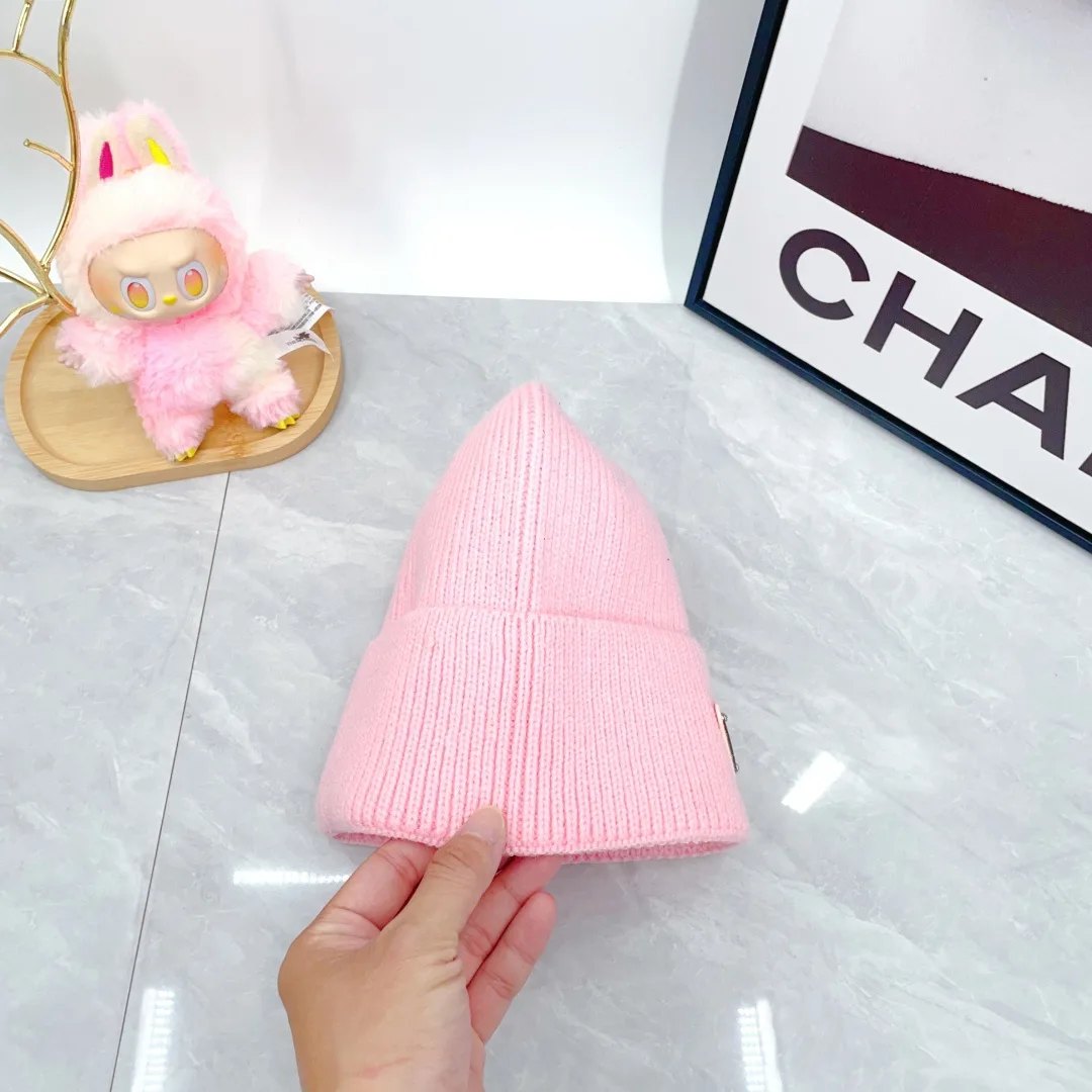 Prada Wool Triangle Logo Knit Beanie in Pink · view 5