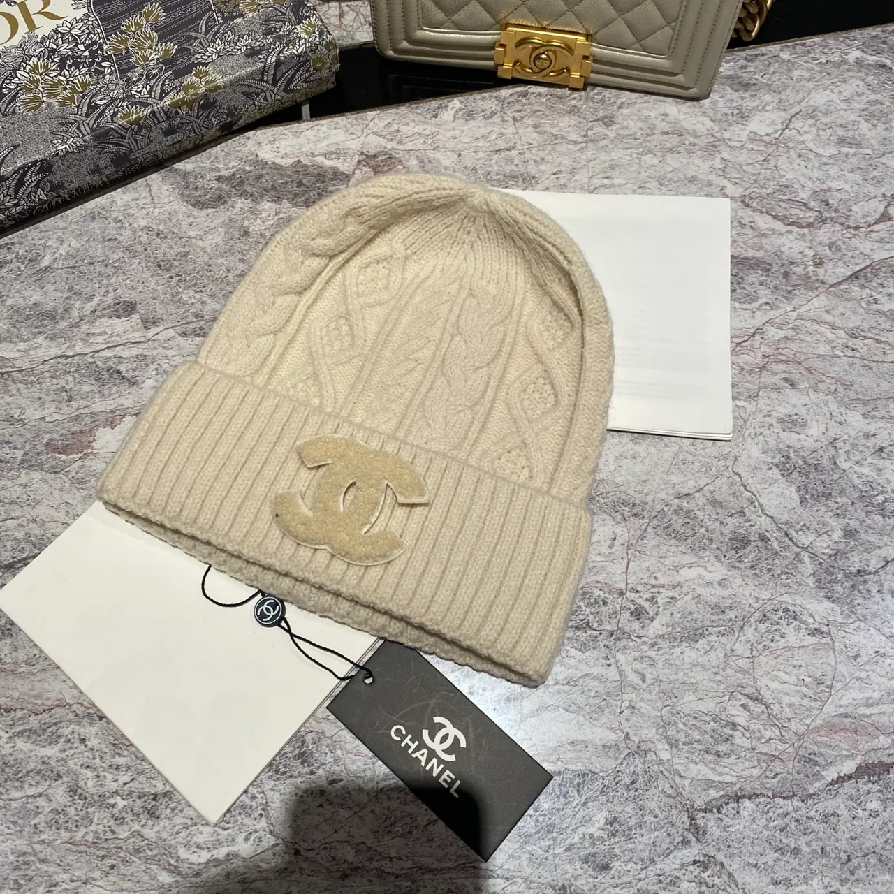 Chanel Cable-Knit Beanie in Black / White / Cream / Tan / Grey · view 7