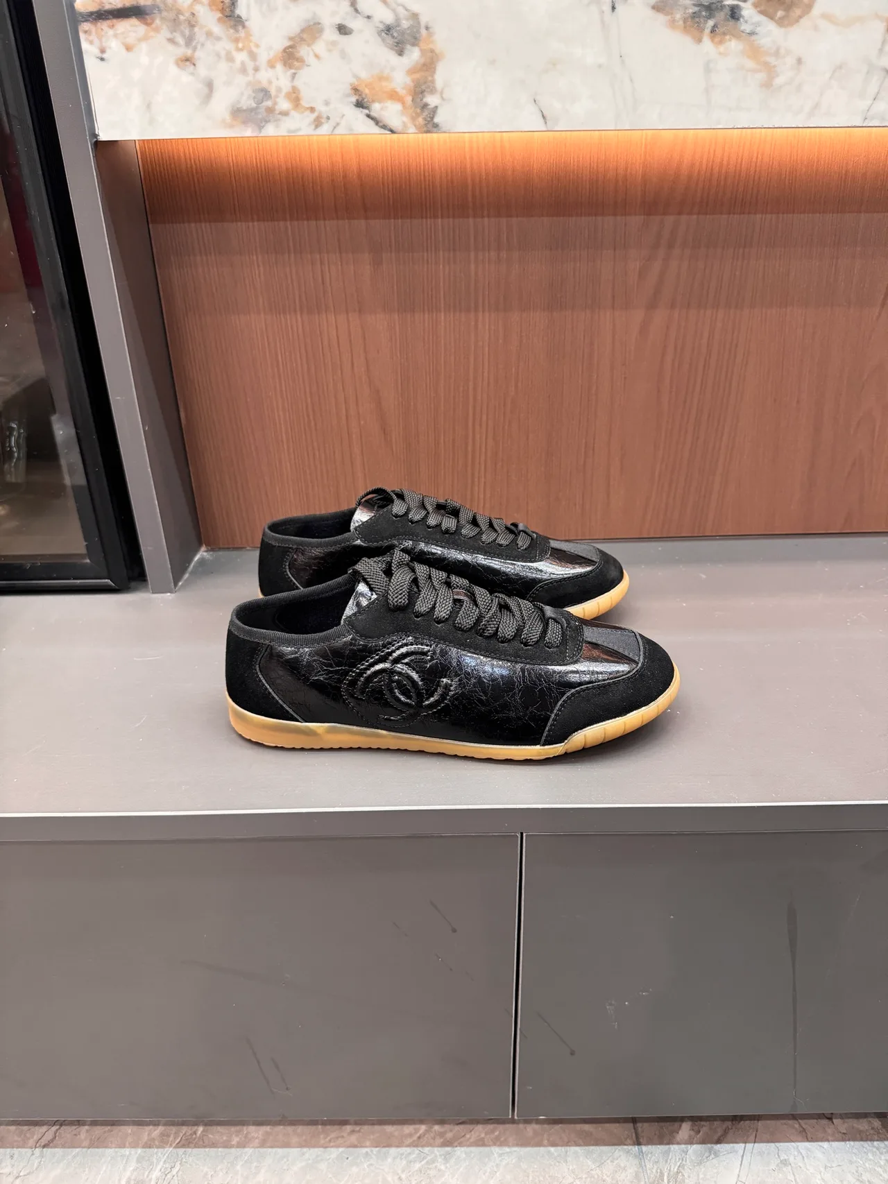 Chanel Cowhide Sneakers in Black · view 1