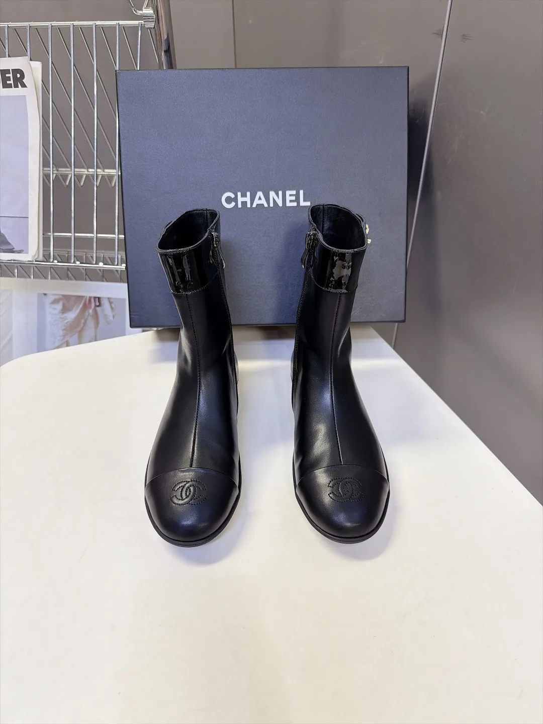 Chanel Calfskin Glossy Pointed-Toe Ankle Boots in Black · view 1