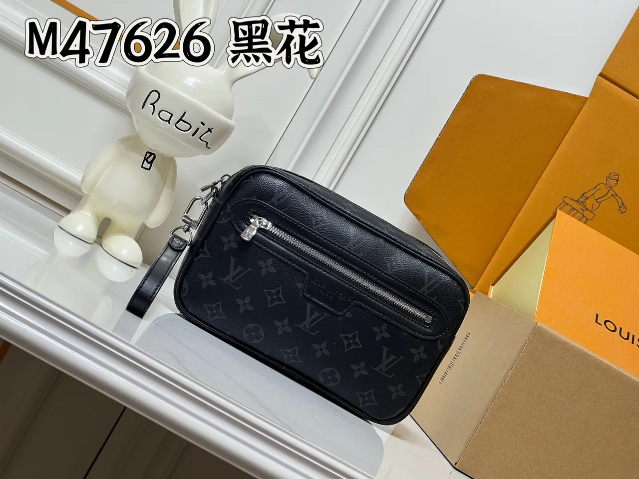 Louis Vuitton Canvas Wristlet Pouch in Black · view 1