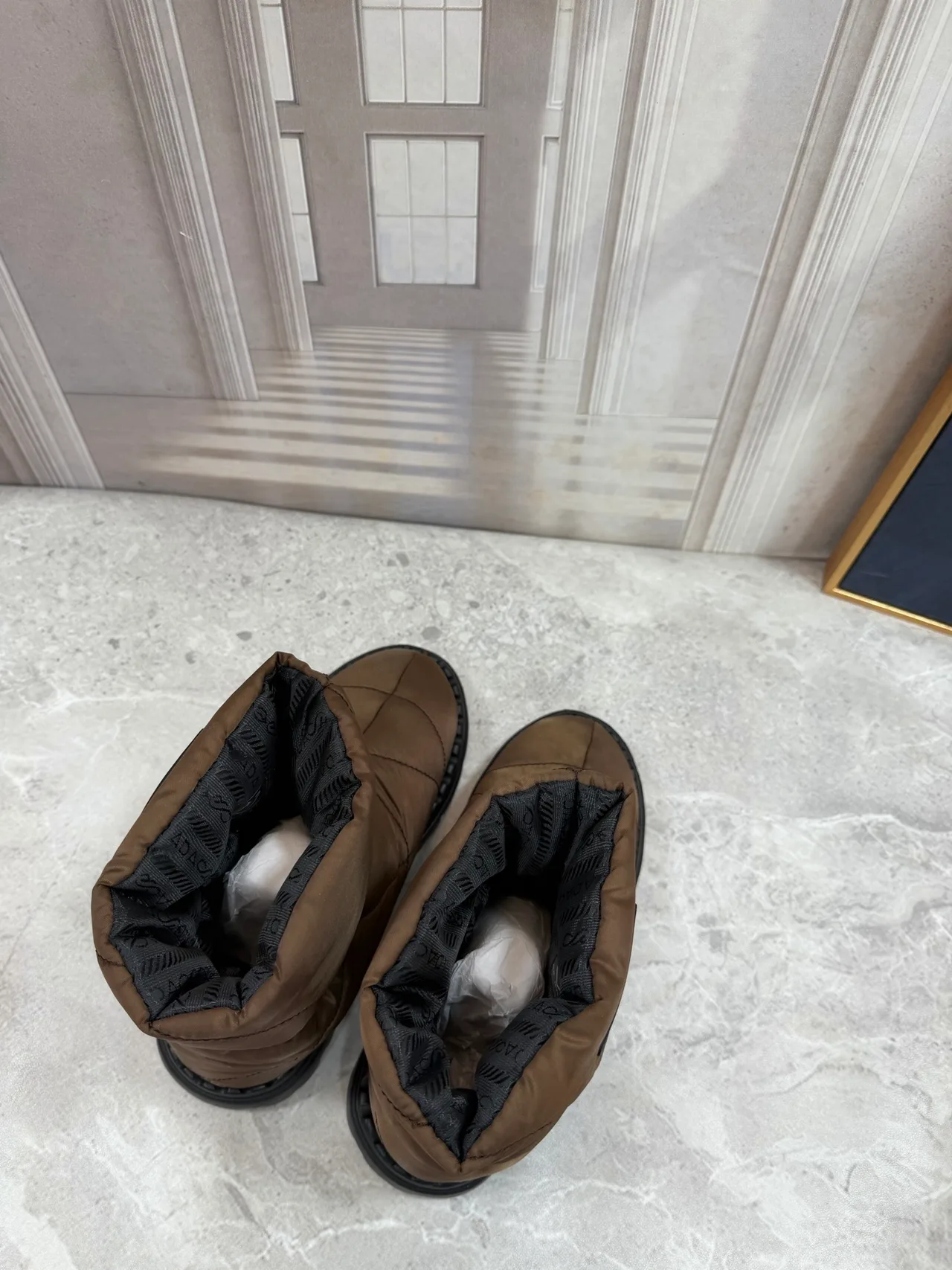 Prada Quilted Round-Toe Puffer Boots in Brown · view 4