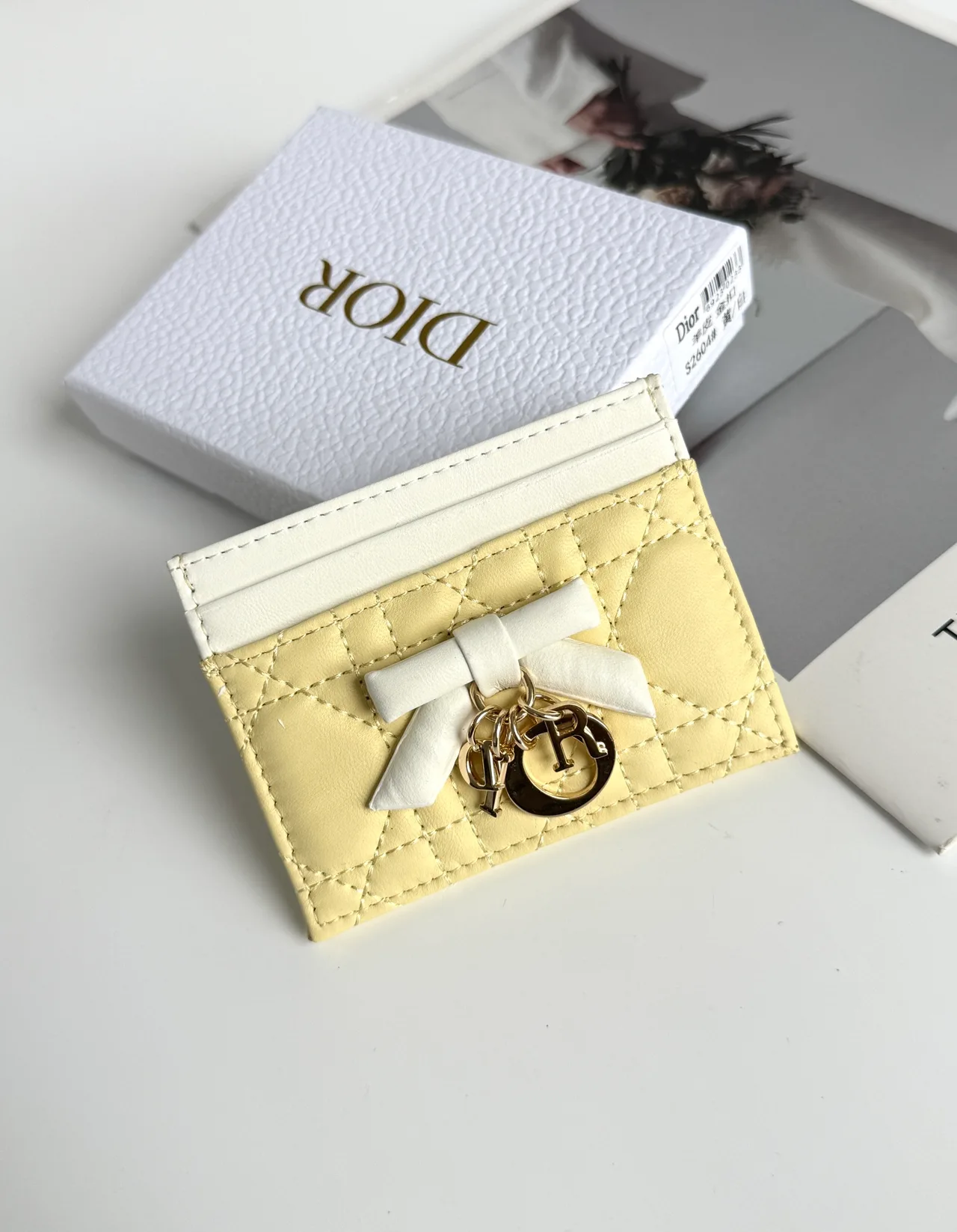Dior Lambskin Quilted Bow Cardholder in Yellow · view 1