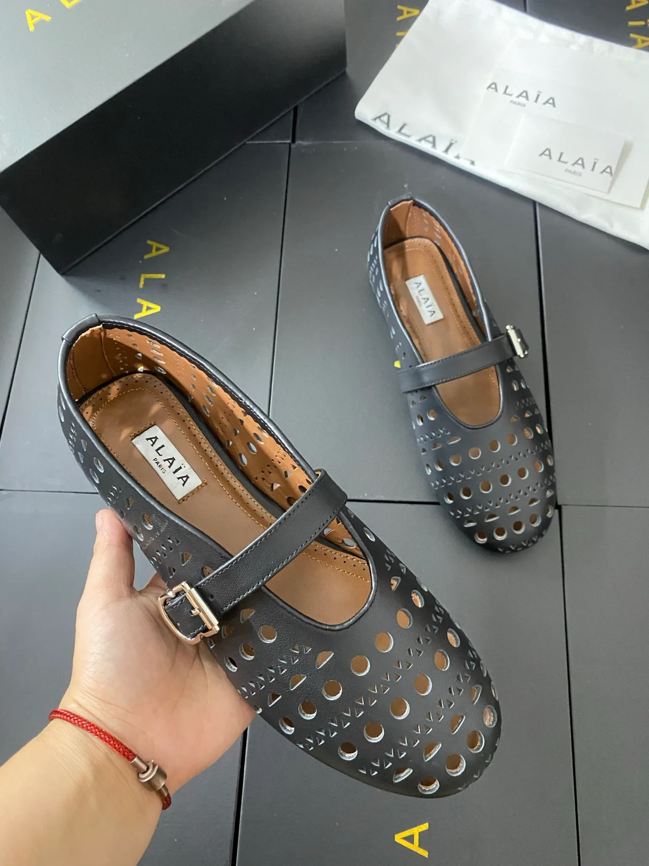 Alaia Cowhide Sheepskin Buckle Studded Mary Jane Flats in Black · view 7