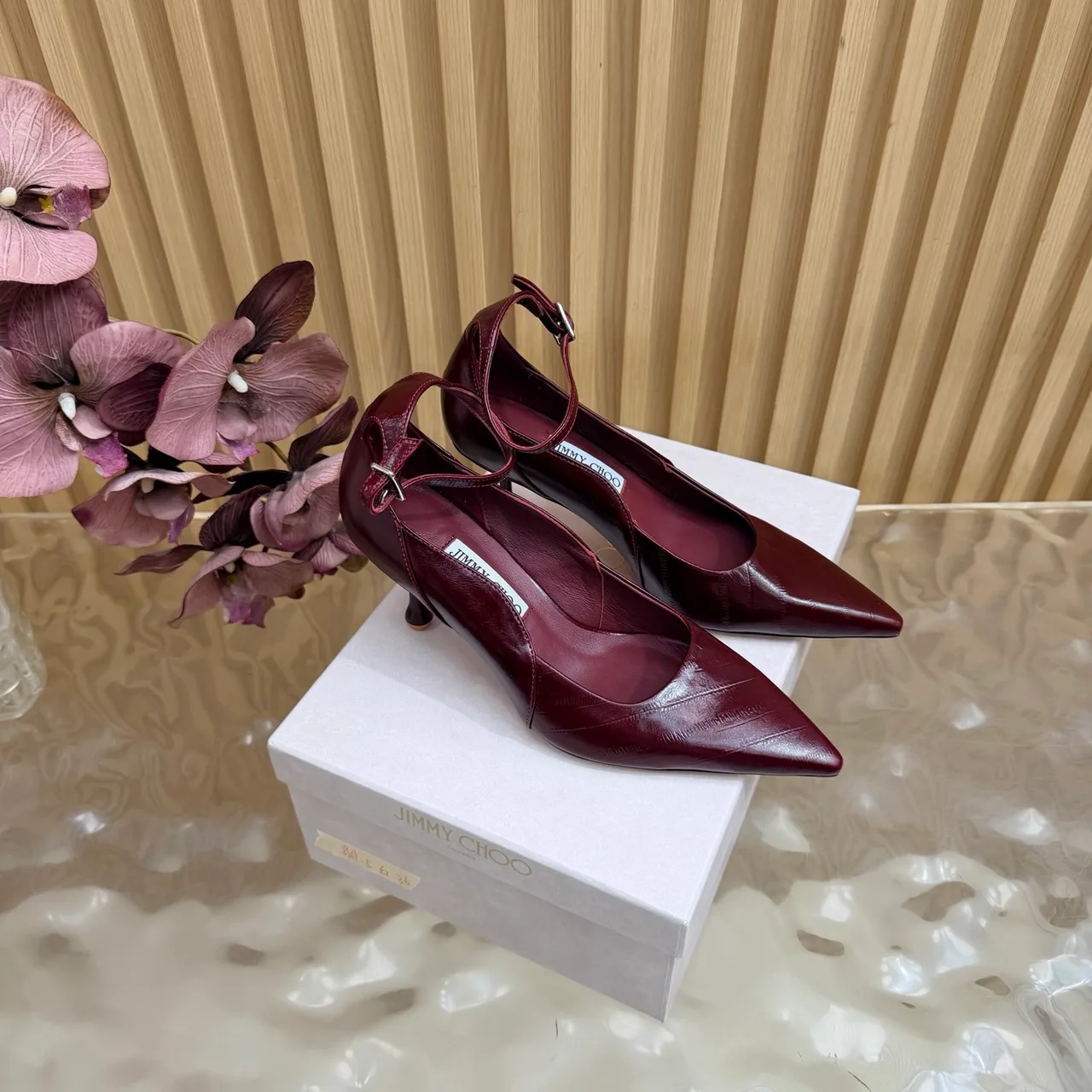 Jimmy Choo Cowhide Glossy Pointed-Toe Pointed Heel Pumps in Burgundy · view 1