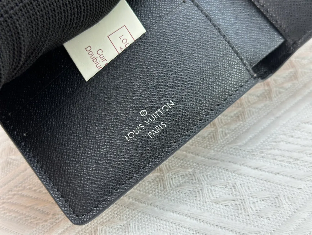 Louis Vuitton Calfskin Bifold Wallet in Brown · view 8