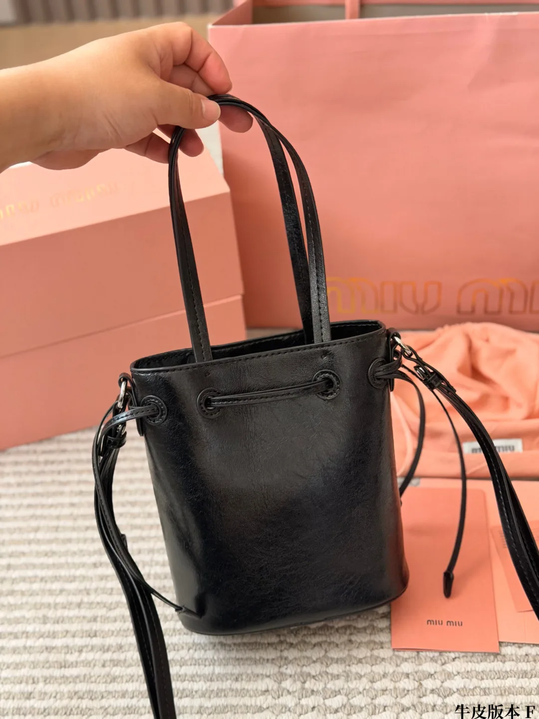 Miu Miu Cowhide Bucket Bag in Black · view 5