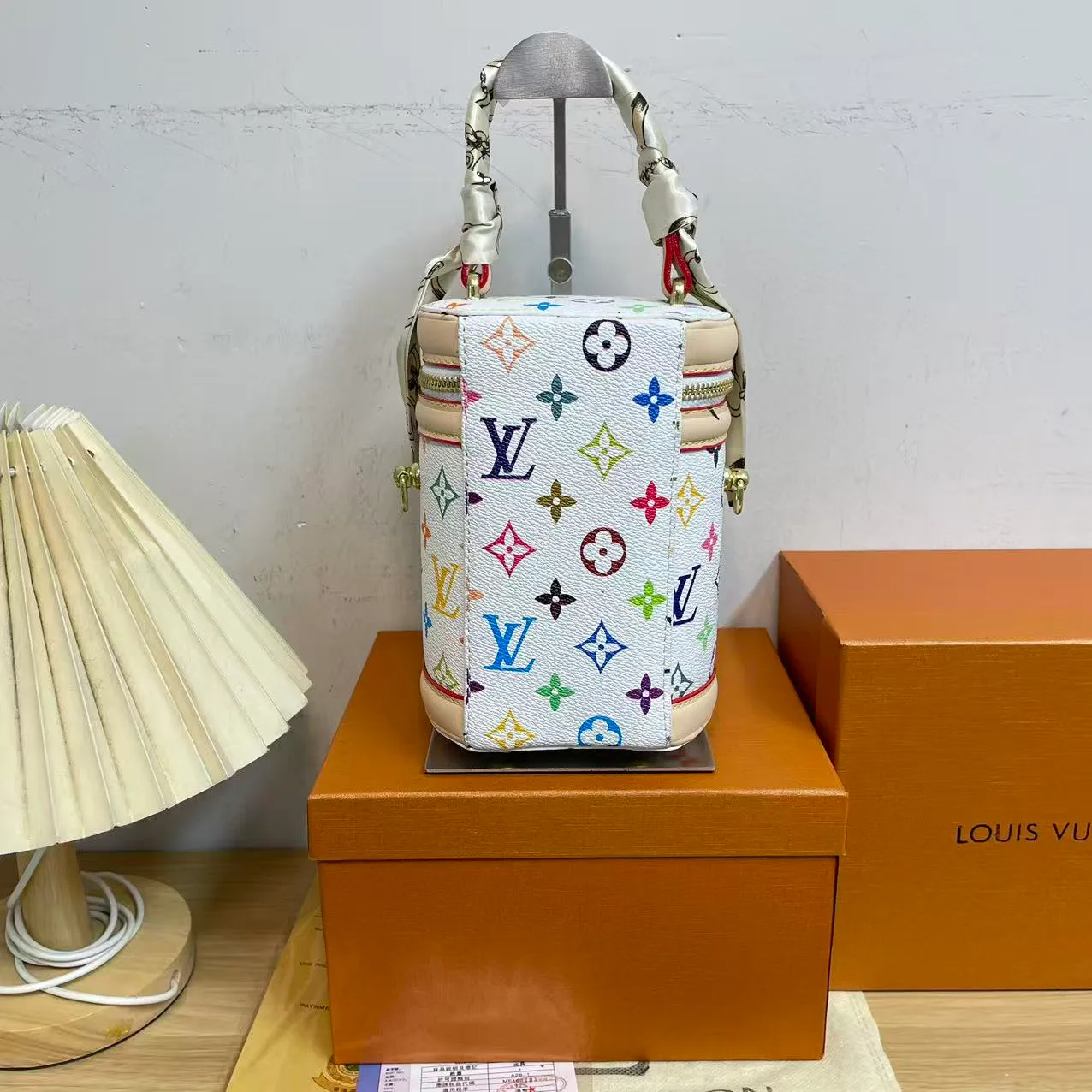 Louis Vuitton Cylindrical zip bucket bag in Black & Green & Cream & Brown & White · view 6