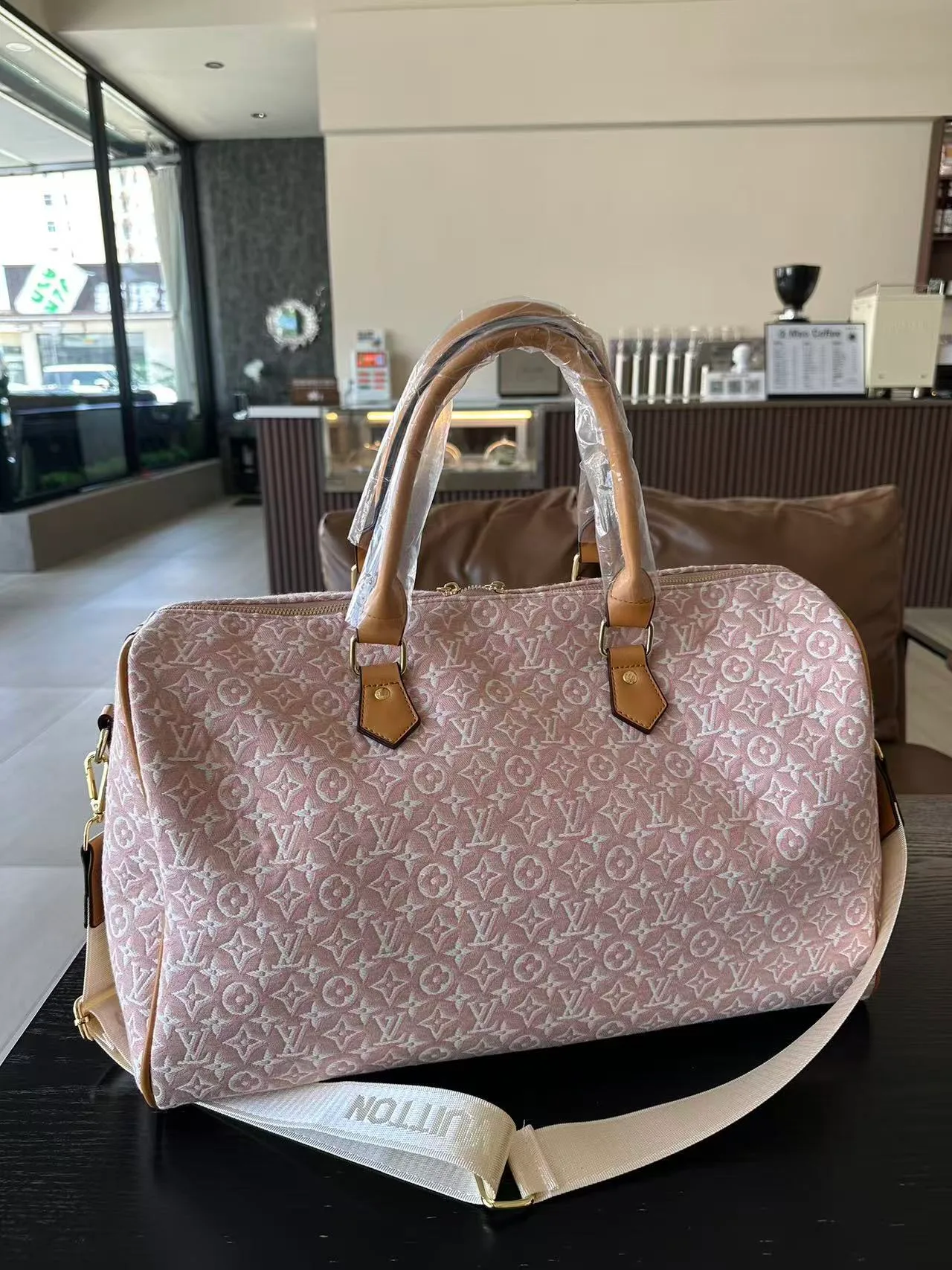 Louis Vuitton Duffel Bag in Pink · view 8