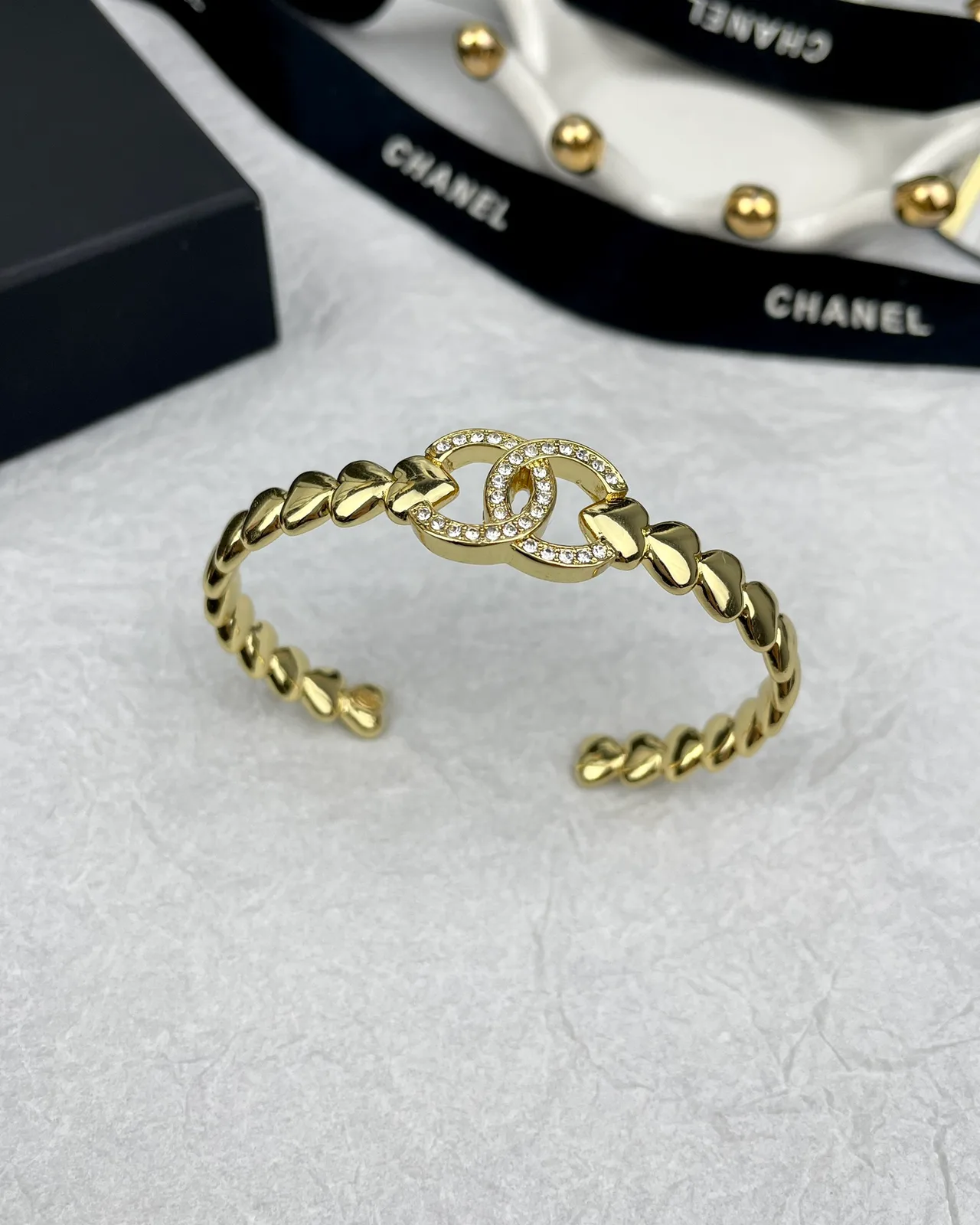 Chanel Open Cuff Bracelet in Gold · view 1