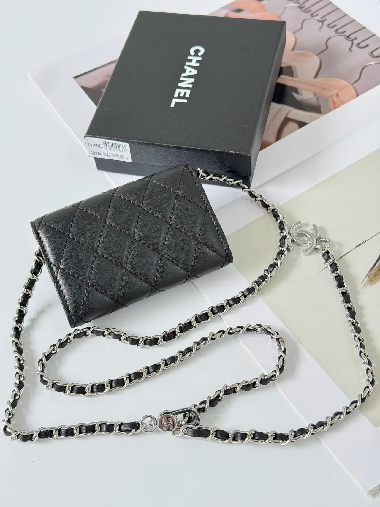 Chanel Quilted Glossy Handbag in Black · view 2