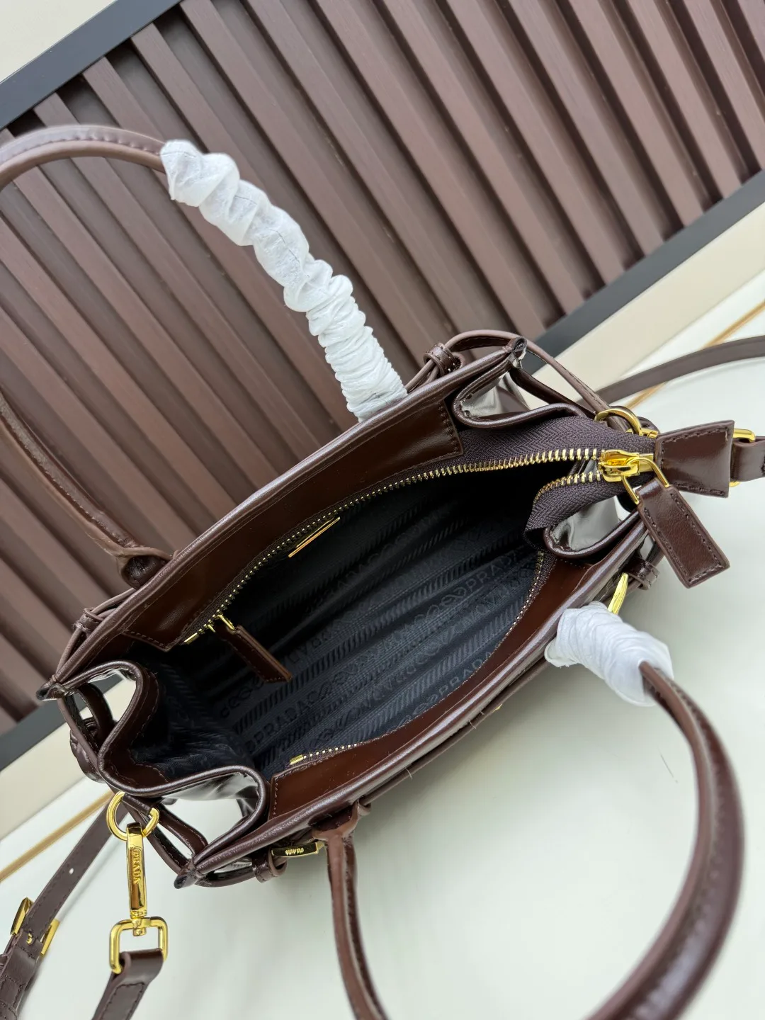 Prada Calfskin Buckle-Detail Structured Top-Handle Bag in Brown · view 7