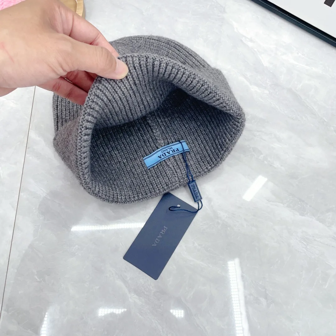 Prada Wool Triangle Logo Knit Beanie in Grey · view 7