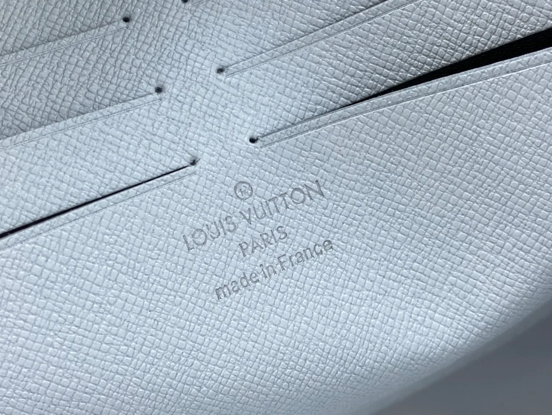 Louis Vuitton Cowhide Canvas Clutch in Blue · view 8