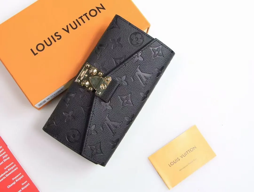 Louis Vuitton Cowhide Long Wallet in Black · view 6