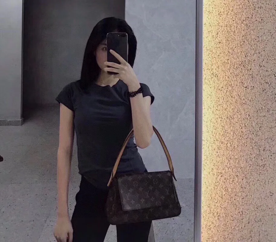 Louis Vuitton Shoulder Bag in Brown · view 2