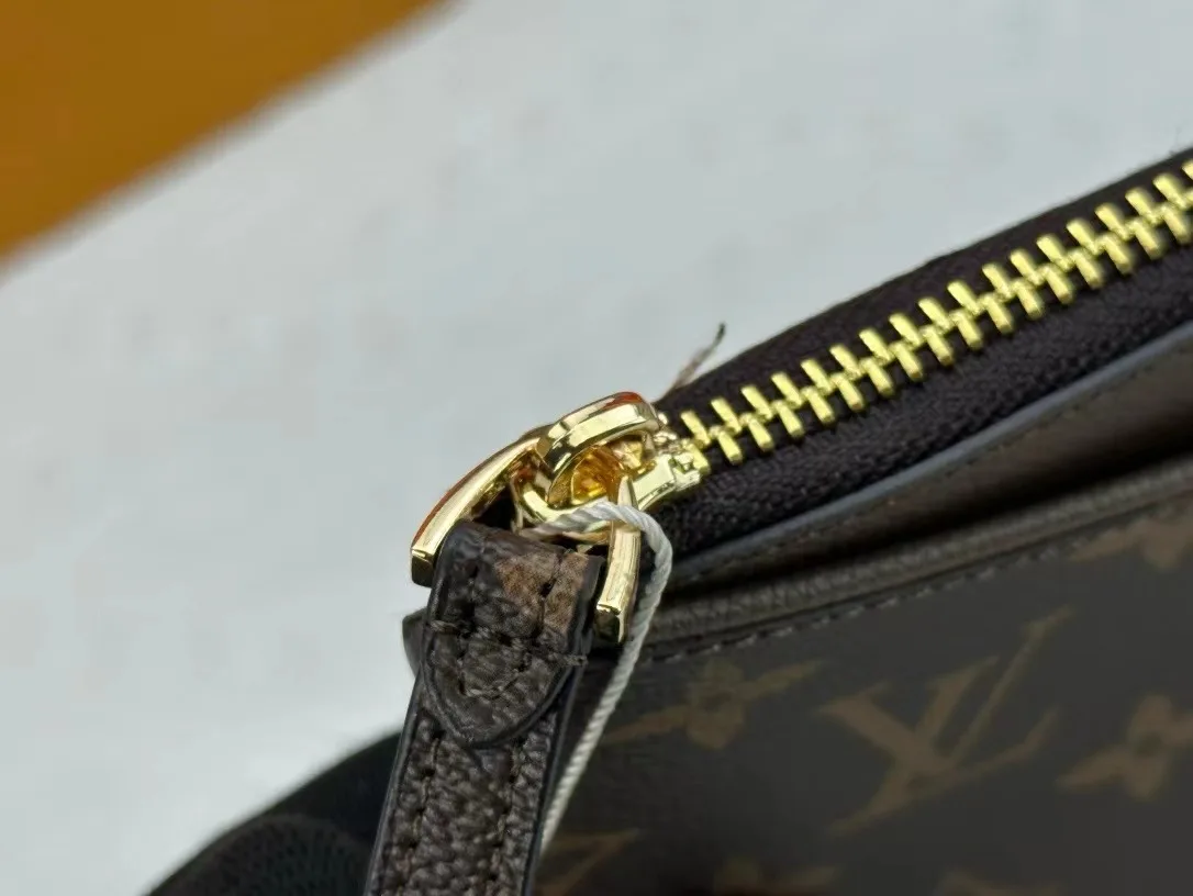 Louis Vuitton Calfskin Wristlet Pouch in Brown · view 7