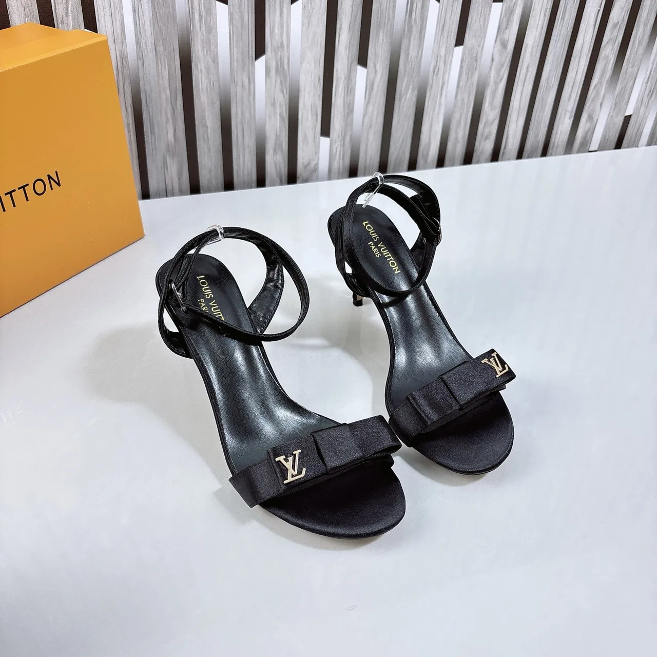 Louis Vuitton Bow Ankle-Strap Sandals in Black · view 6