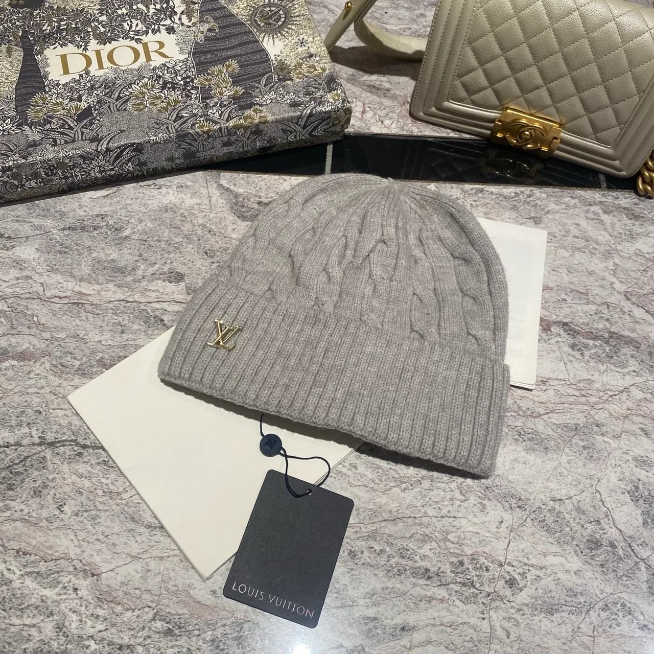 Louis Vuitton Cable-Knit LV Beanie in Grey & Cream & Pink & White & Tan & Burgundy & Blue & Black · view 1