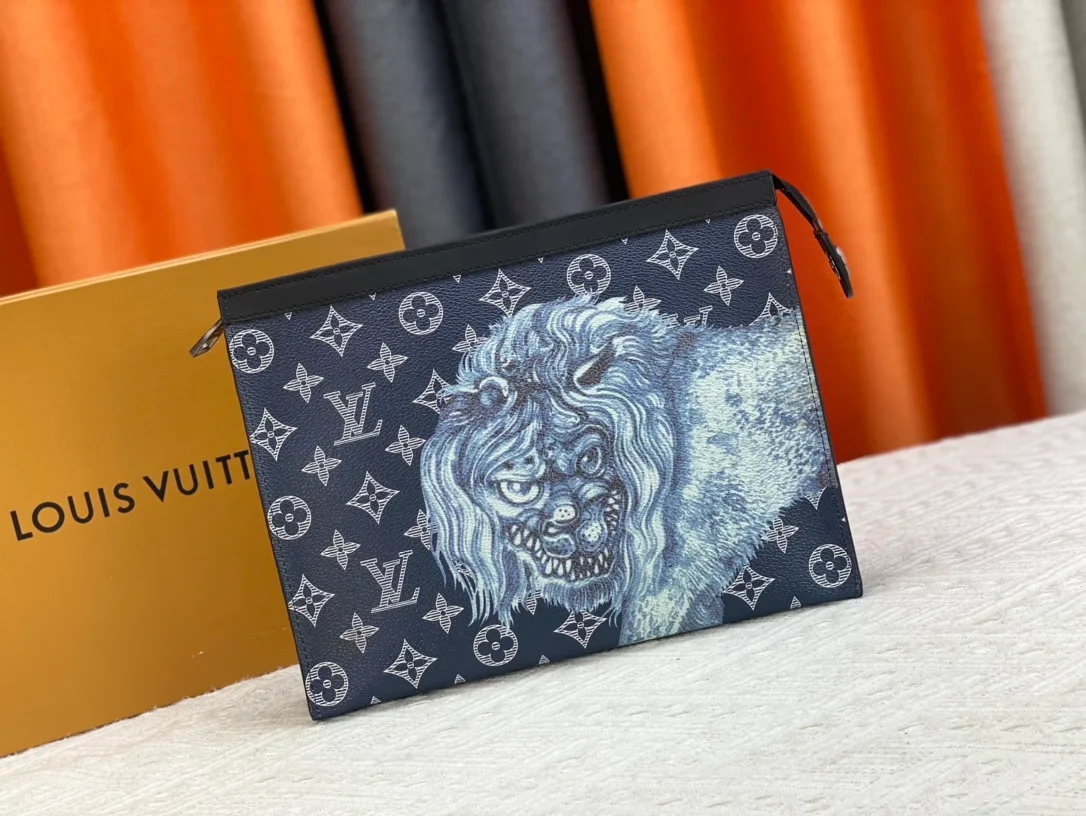 Louis Vuitton Canvas Clutch in Blue · view 1