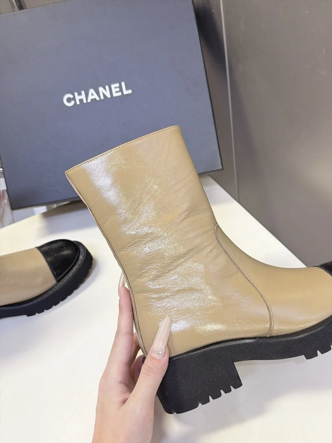 Chanel Cowhide Patent Leather Glossy Round-Toe Ankle Boots in Beige · view 8