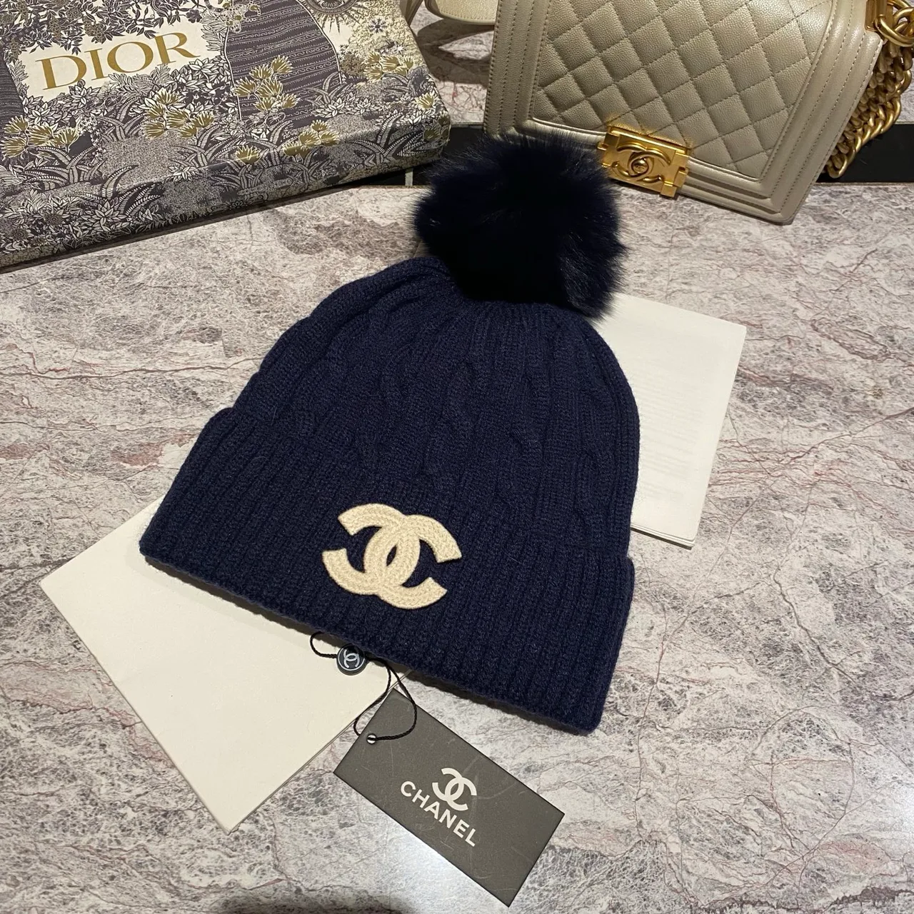 Chanel CC pom knit beanie in Blue & Burgundy & Black & White & Grey & Cream & Pink & Tan · view 1