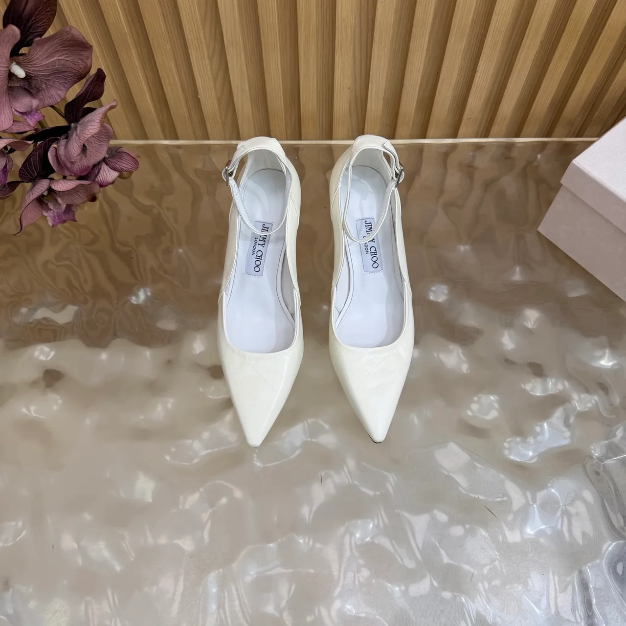 Jimmy Choo Cowhide Glossy Pointed-Toe Pointed Heel Pumps in White · view 1