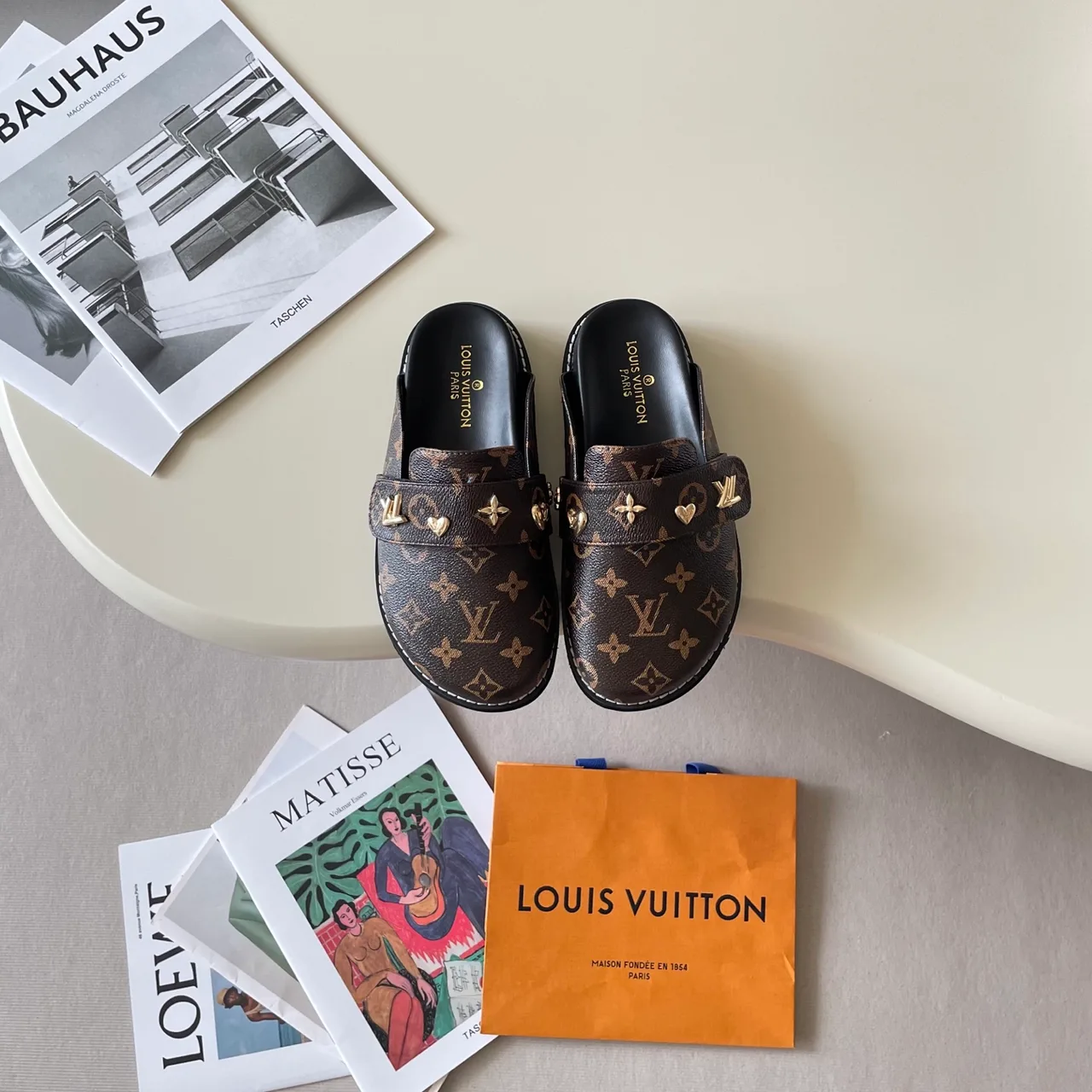 Louis Vuitton Horsebit Mules in Brown / Black / Blue · view 4