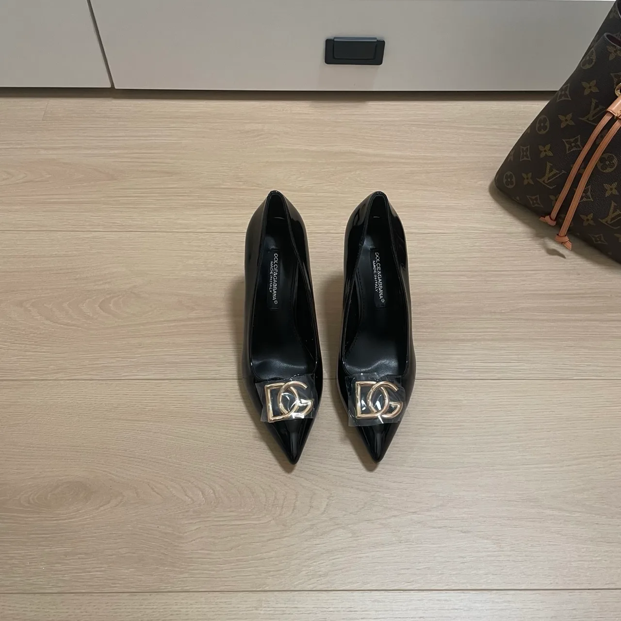 Dolce & Gabbana Sheepskin Patent Leather DG Pointed Heel Pumps in Black · view 1