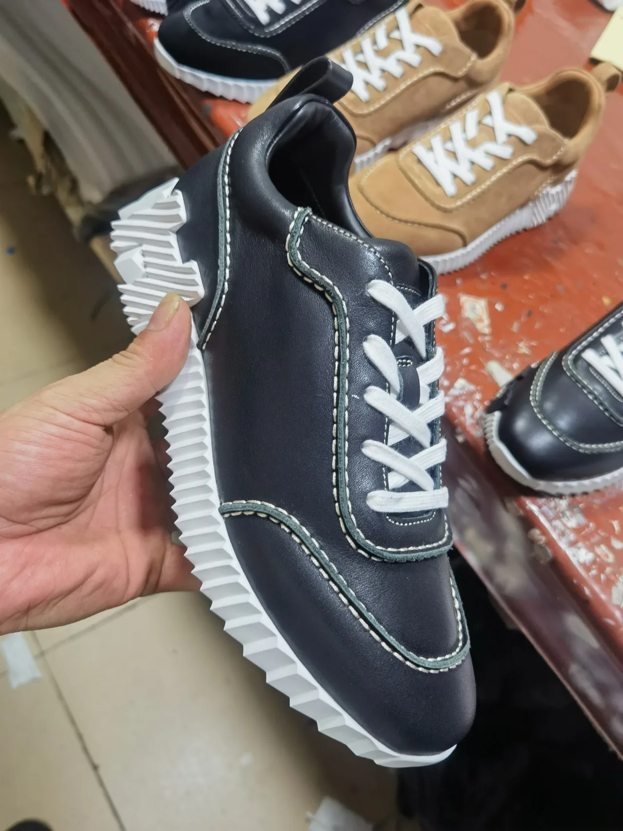 Hermes Smooth Round-Toe Sneakers in Black · view 7