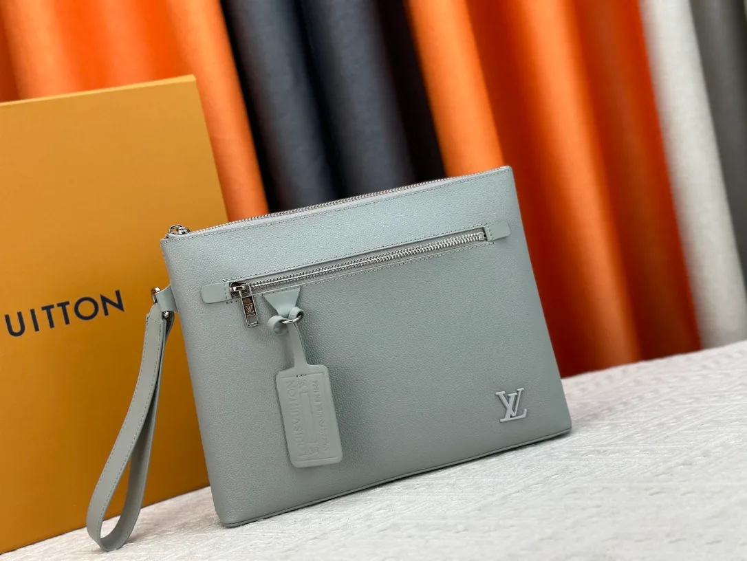 Louis Vuitton Cowhide Clutch in Grey · view 2