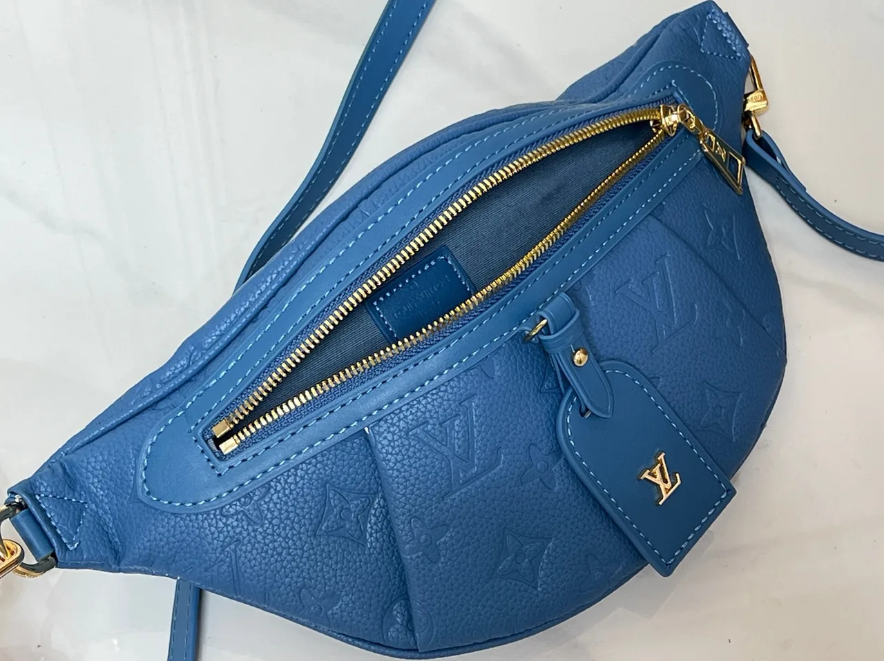 Louis Vuitton Leather Embossed Belt Bag in Blue · view 8