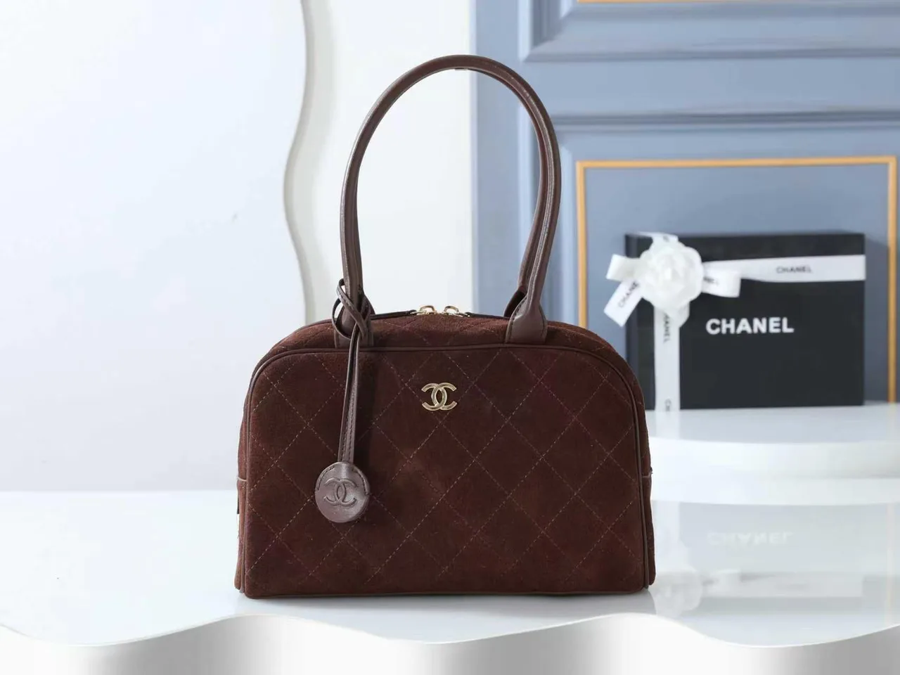 Chanel Quilted Shoulder Bag in Brown · view 1