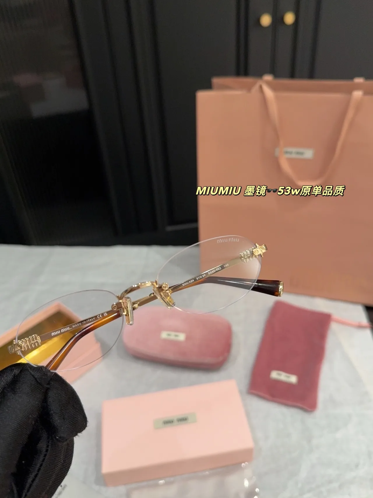 Miu Miu Rimless Glasses in Gold · view 3