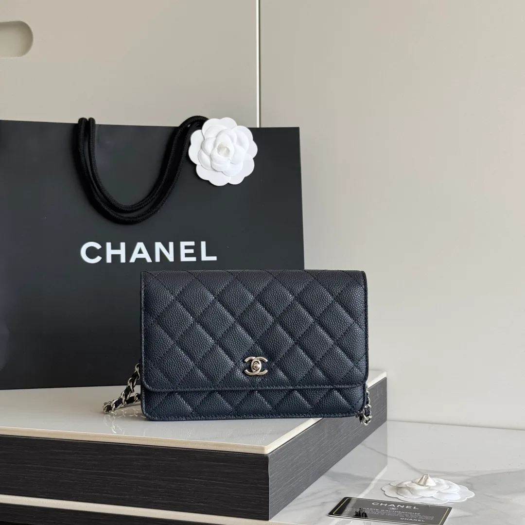 Chanel Calfskin Quilted Clutch in Black · view 1