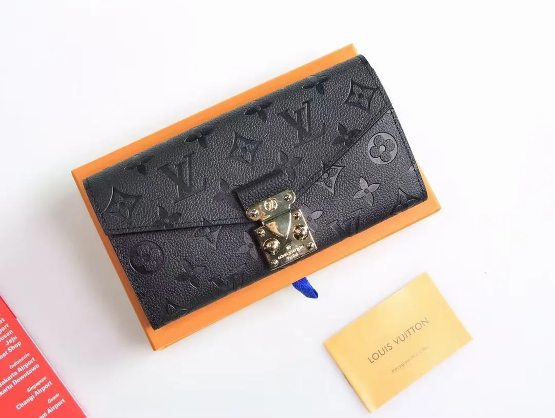 Louis Vuitton Cowhide Long Wallet in Black · view 7