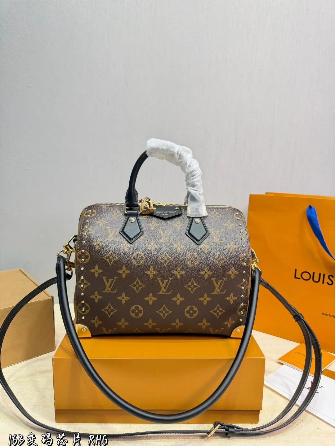 Louis Vuitton Cowhide Canvas Top-Handle Bag in Brown · view 1
