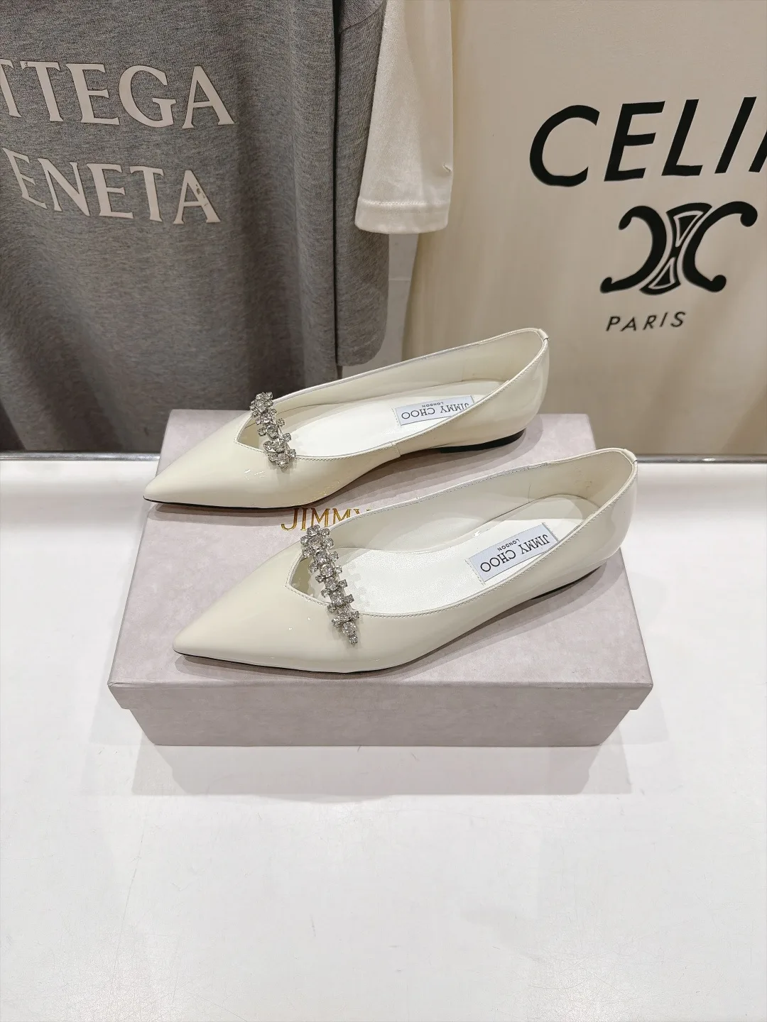 Jimmy Choo Cowhide Glossy Pointed-Toe Flats in White · view 3