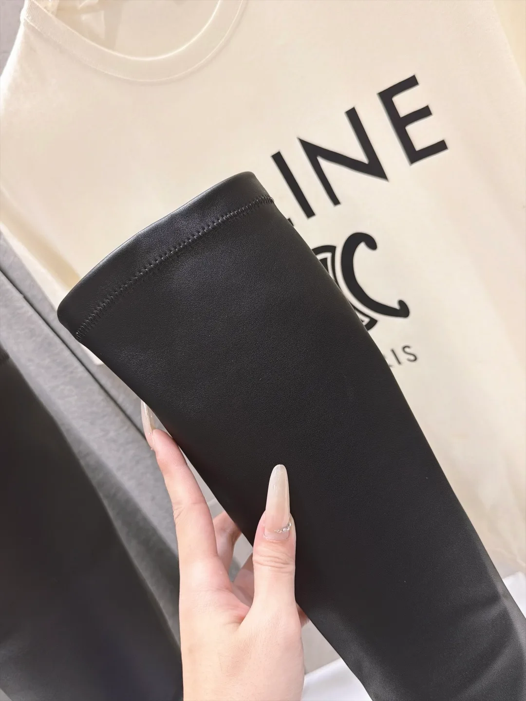Silk Glossy Round-Toe Minimal Knee-High Boots in Black · view 7