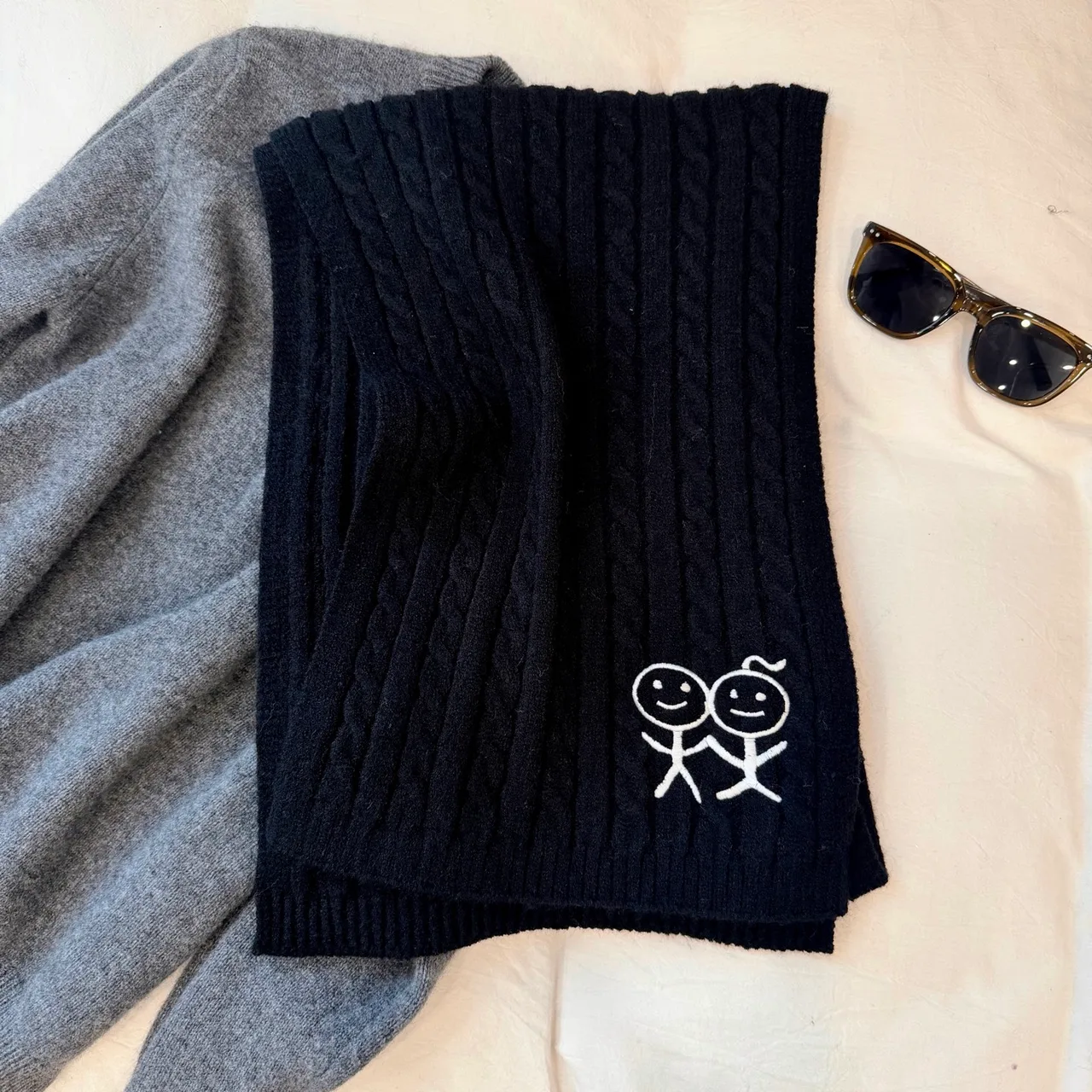 Embroidered Stick-Figure Ribbed Scarf in Black · view 1