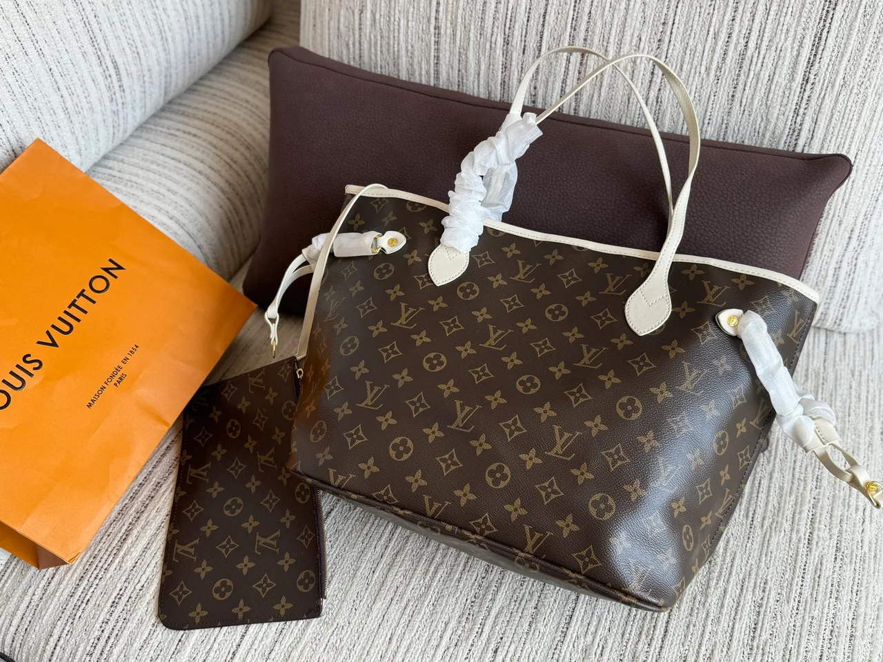 Louis Vuitton Neverfull Tote in Brown · view 1