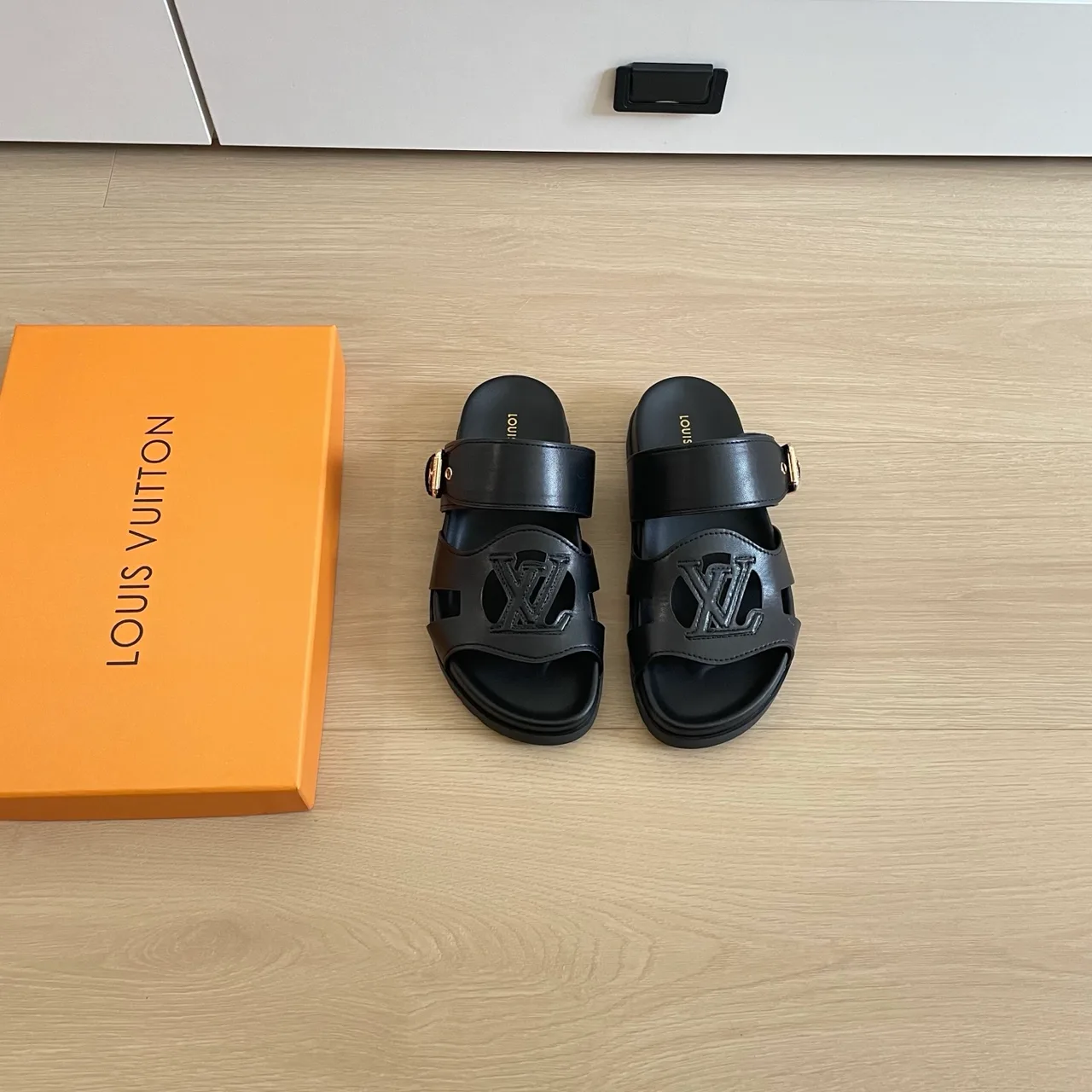 Louis Vuitton Leather Buckle Sandals in Black · view 1
