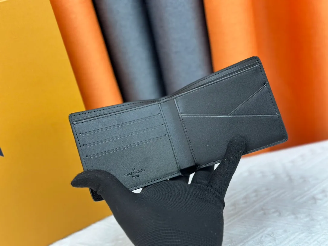 Louis Vuitton Leather Bifold Wallet in Grey · view 3