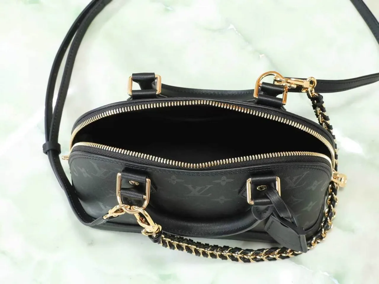 Louis Vuitton Cowhide Quilted Handbag in Black · view 8