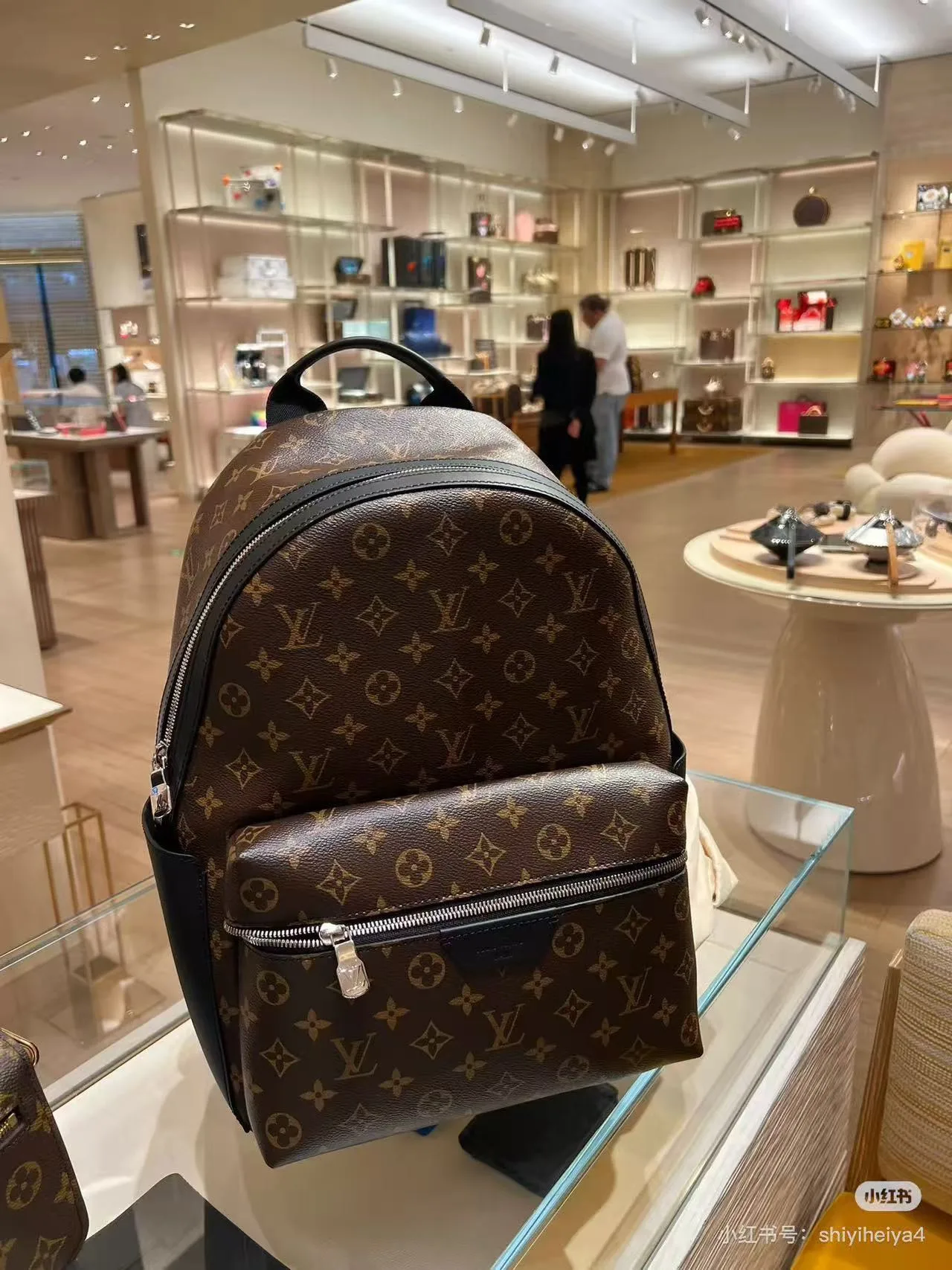 Louis Vuitton Monogram Backpack in Brown / Black · view 3