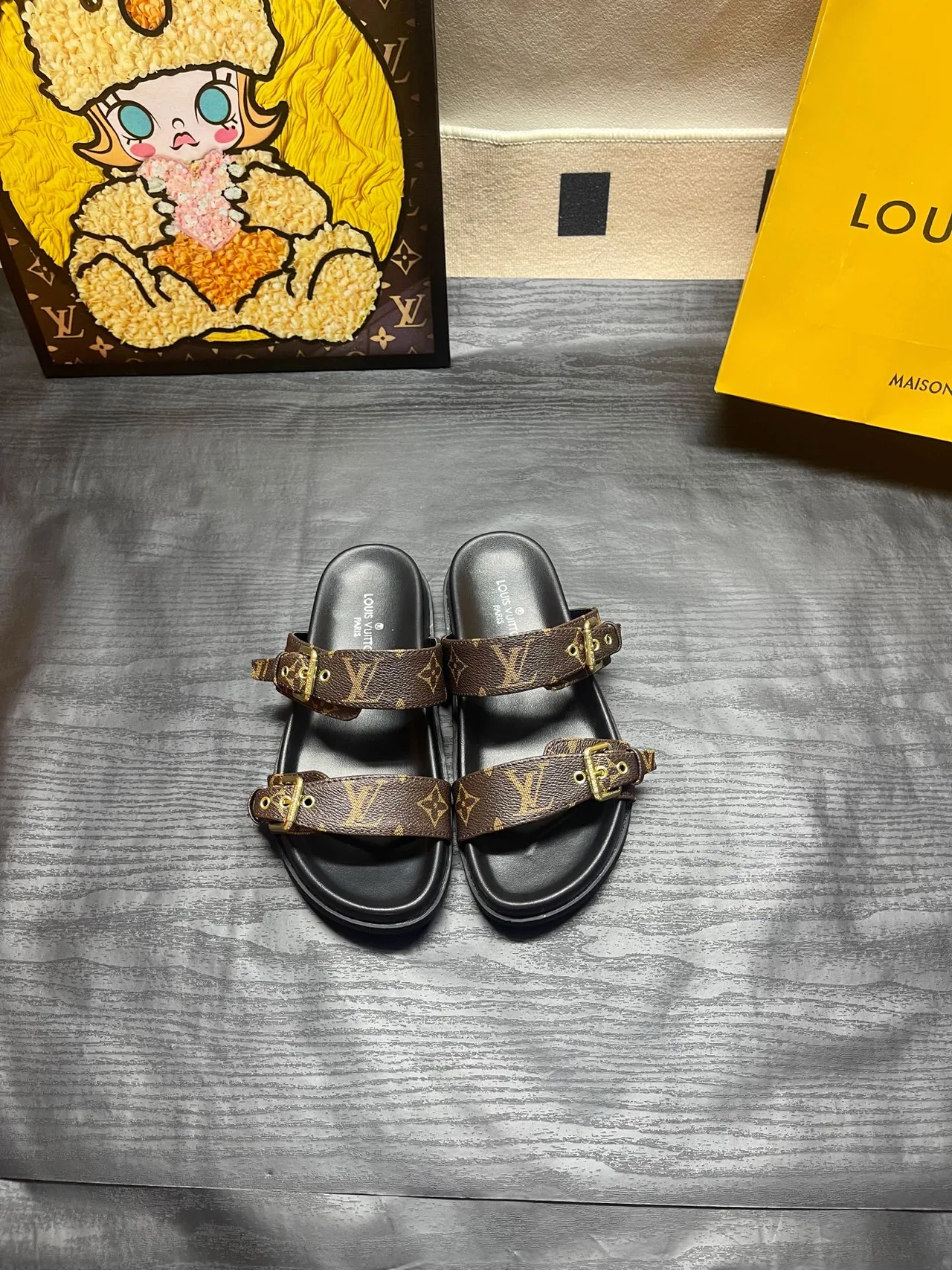 Louis Vuitton Double-strap monogram slides in Black / Brown · view 3