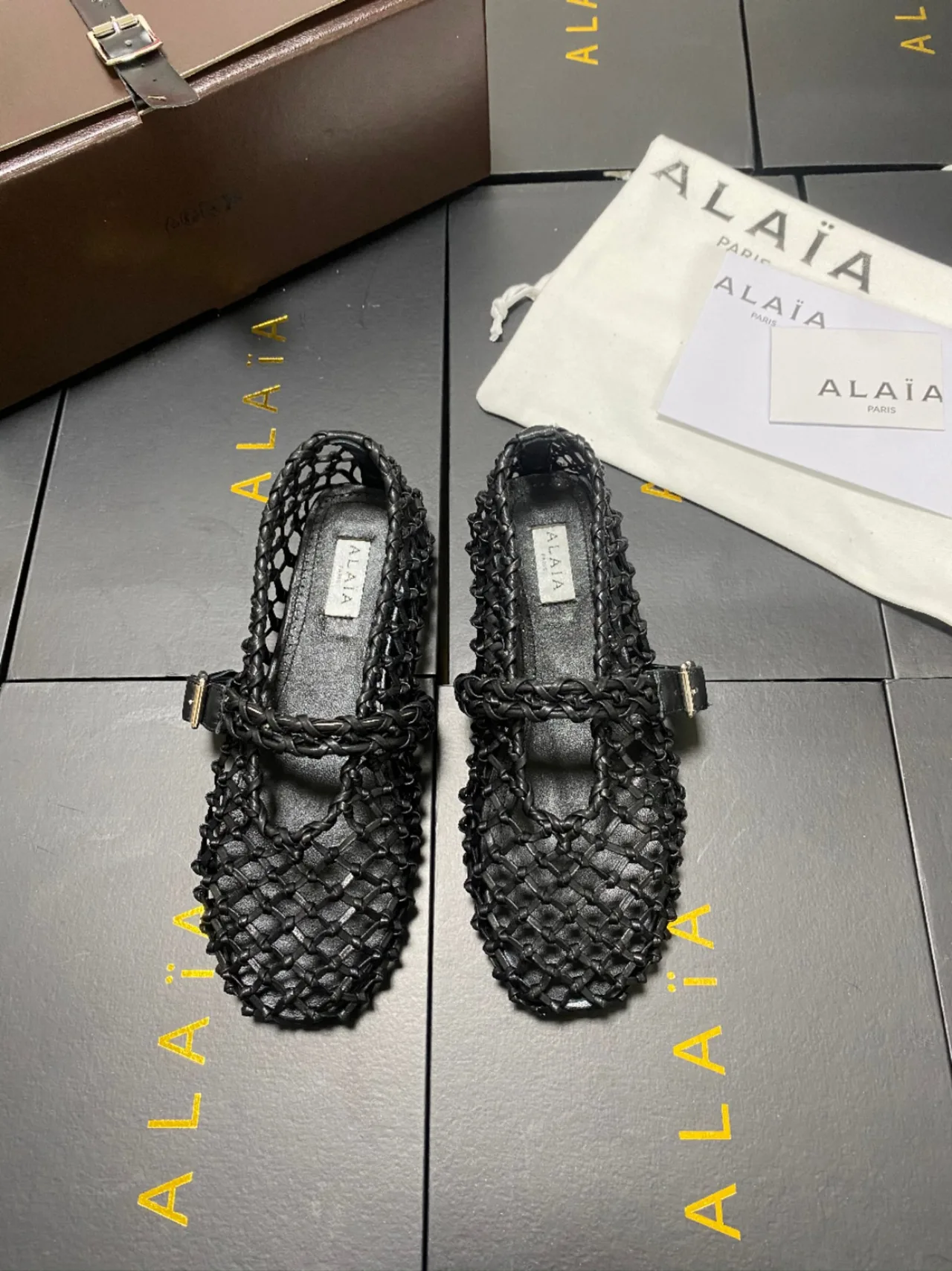 Alaia Cowhide Sheepskin Square-Toe Woven Mary Jane Flats in Black · view 1