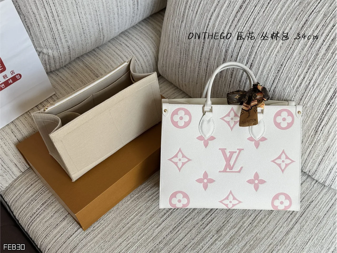 Louis Vuitton OnTheGo Mini Monogram Top-Handle Tote in White · view 1