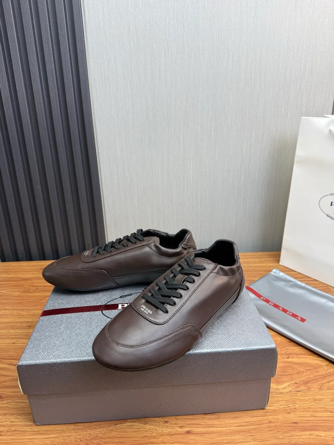 Prada Cowhide Quilted Round-Toe Sneakers in Brown · view 3