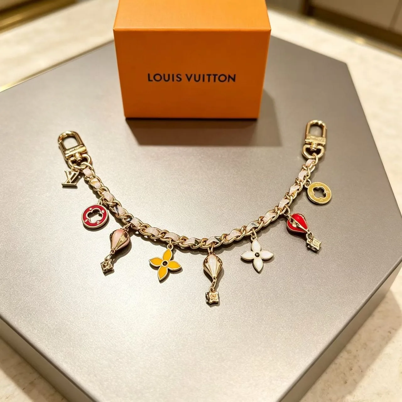 Louis Vuitton Hot-Air-Balloon and Flower Chain Charm in Gold · view 3